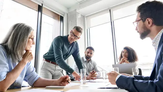 People working to design something