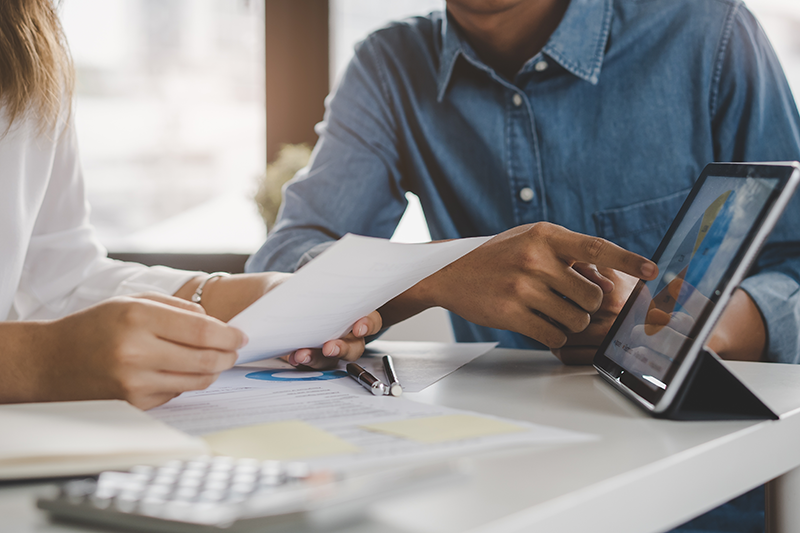 people looking at a diagram