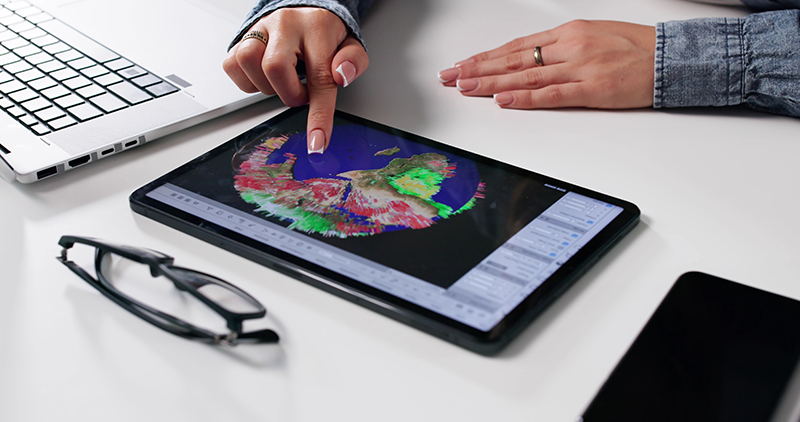 Person analysing weather on a tablet